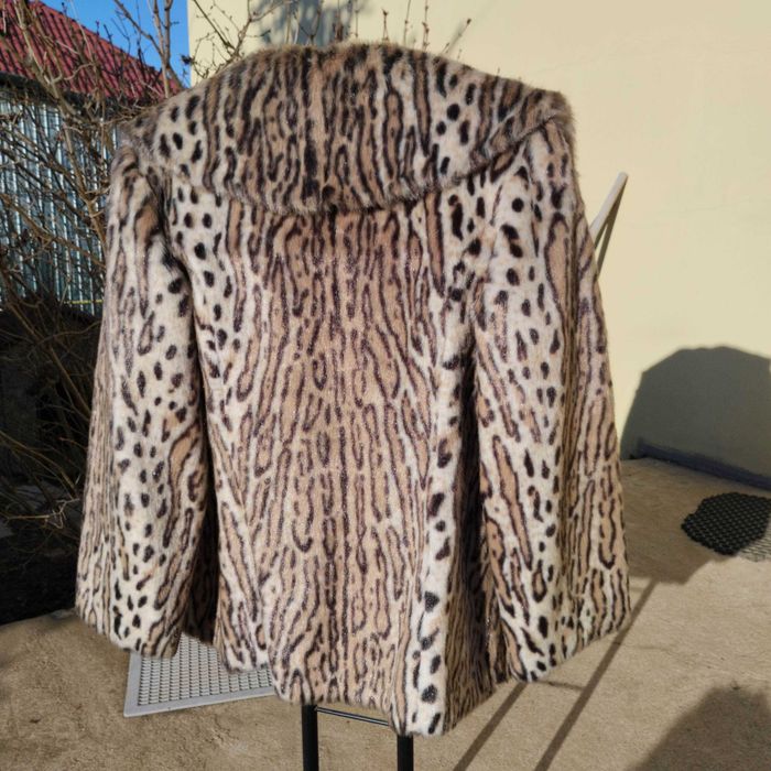 Haină de blană artificială