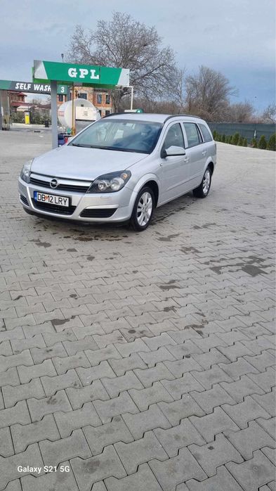 Vand sau schimb astra h 1.6benzina