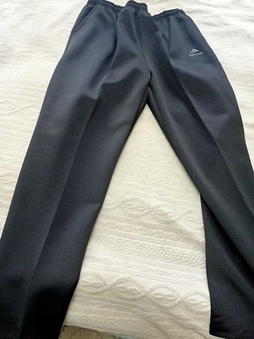 мужские спортивные штаны . цвет черный. новые.