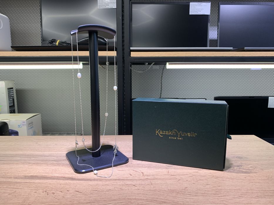 Продается серебряное колье с подвесками в виде птиц и жемчугом