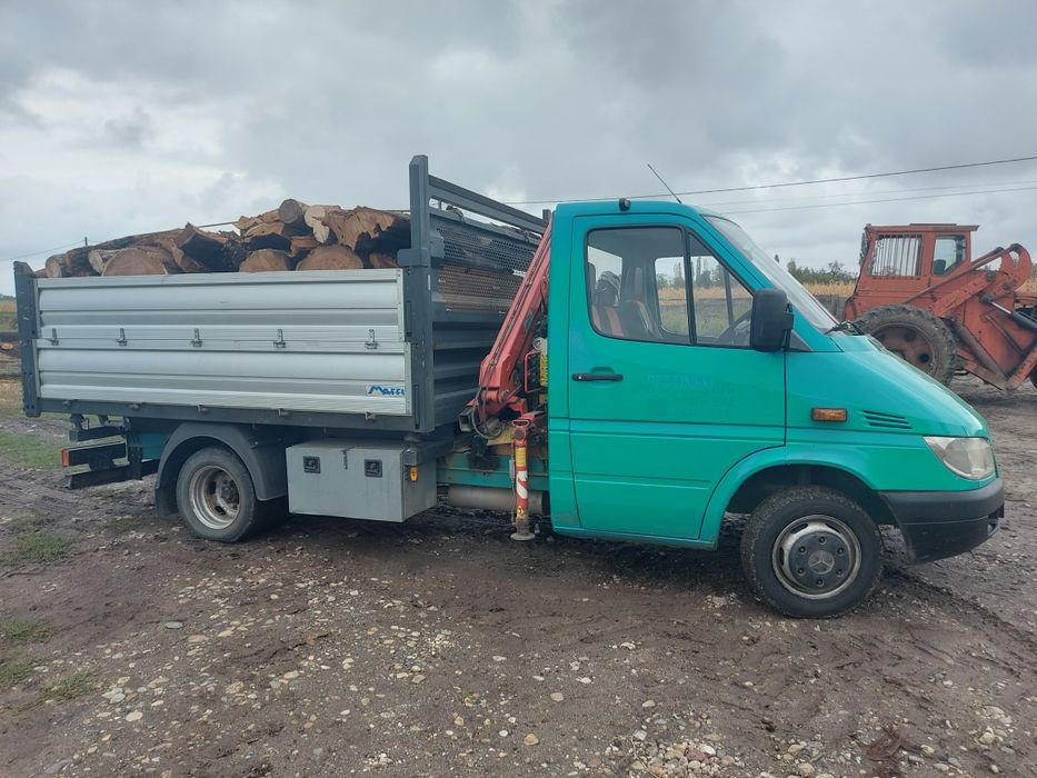 Transport marfa cu macara și basculabila