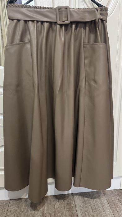 Юбка кожаная с карманами