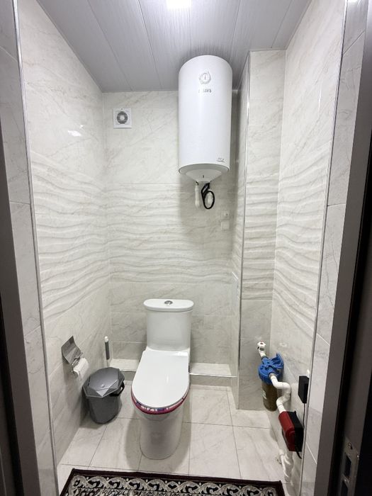 3 xonali 90 kv 4 etash 8 etashli bino