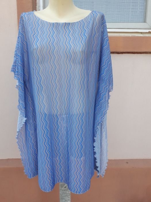 Tunica super draguta pentru plajă  .