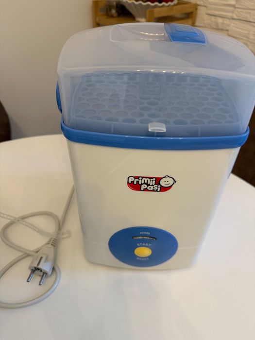 Sterilizator electric cu aburi pentru 8 biberoane Primii Pasi