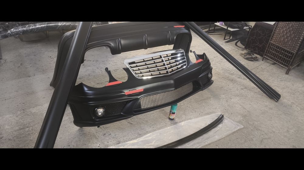 W211 amg63  полный комплект обвесов бампера пороги спойлера козырьки р