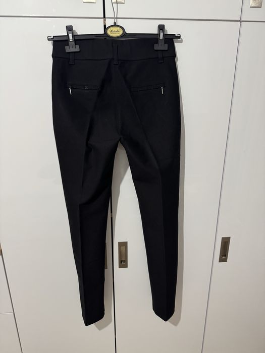 Pantaloni casual cu dunga pe picior