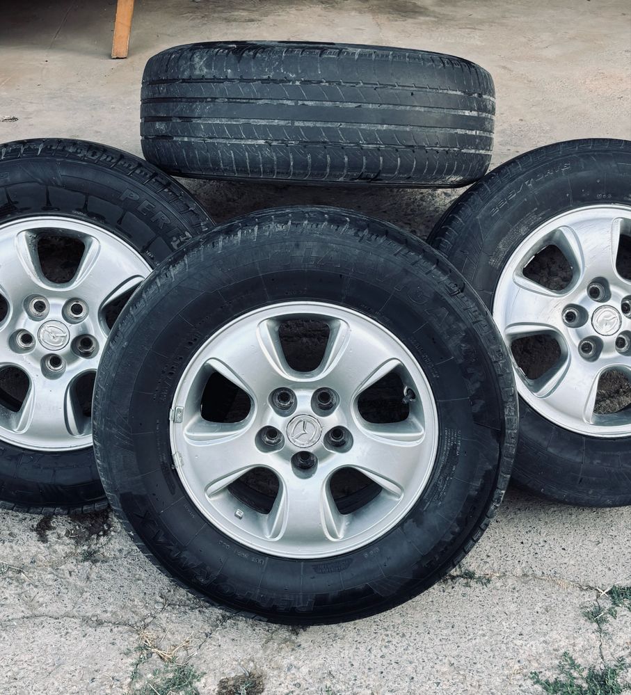 Шины и диски Mazda Tribute. R16