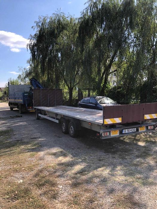 Camion cu macara si remorca cu axa viratoare