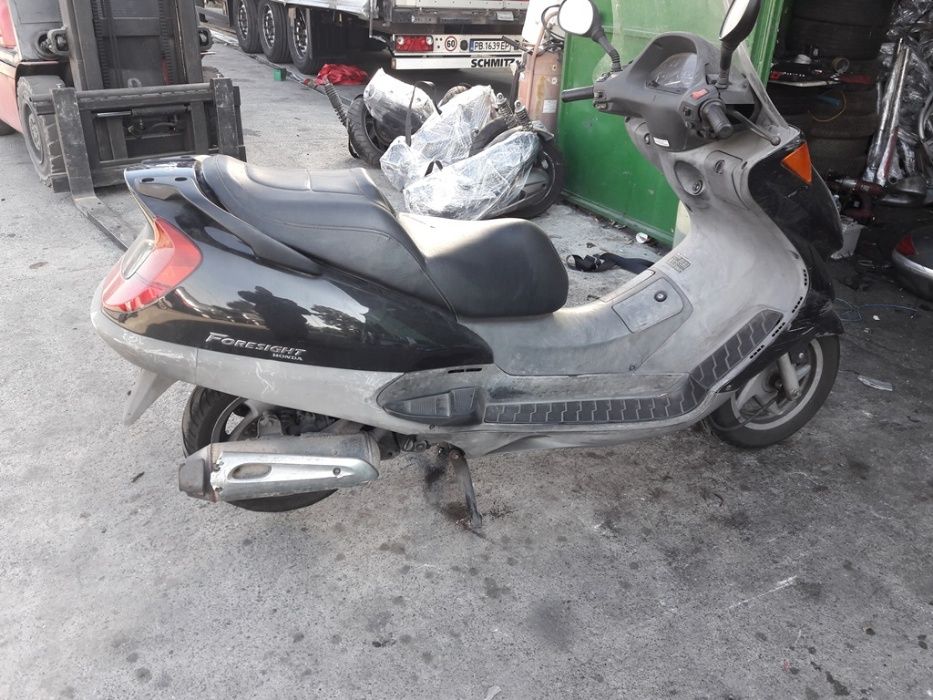 Скутер(мотоциклет)Хонда Форсайт 250Honda Foresight 250() -на части
