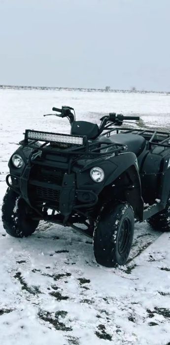 Vând atv kawasaki