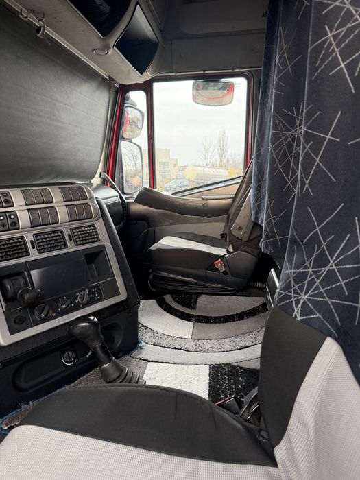 Iveco Stralis / semiremorca Schmitz