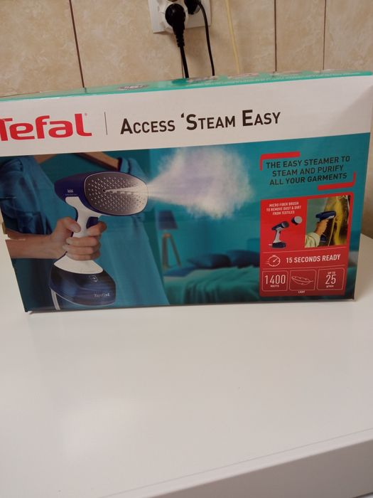 Aparat de calcat cu aburi vertical Tefal