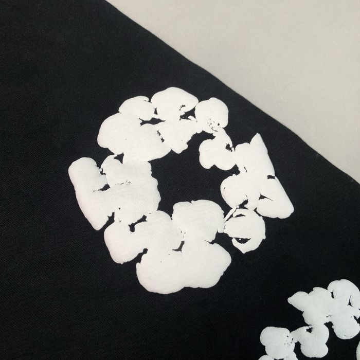 Pantaloni Denim Tears