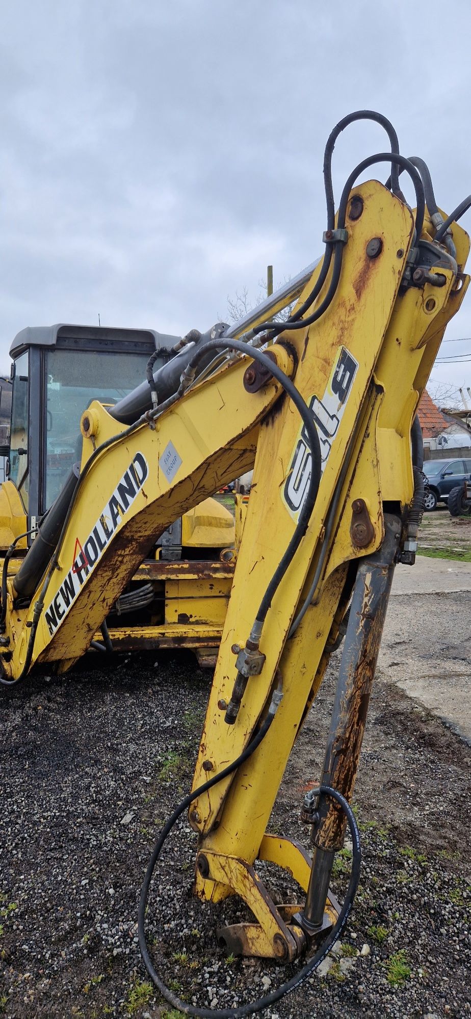 Dezmembrez  Buldoexcavator  New  Holland  B 115 B