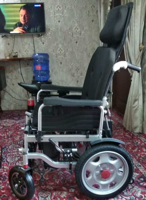 Инвалидная коляска.