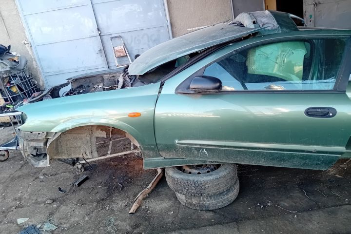 Carcasa termostat 130499F600 Nissan Almera N16