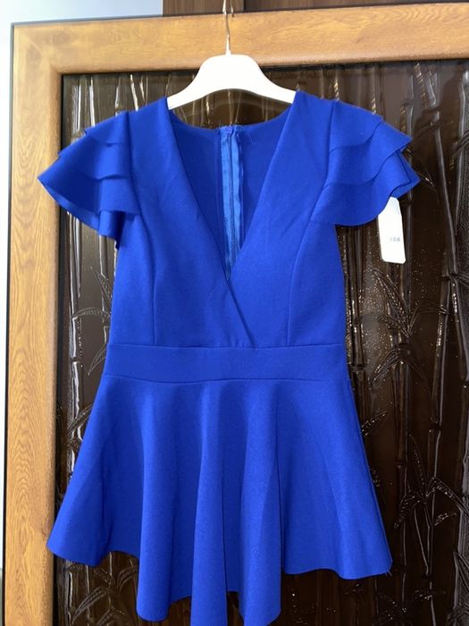 Vând bluza cu fermoar la spate