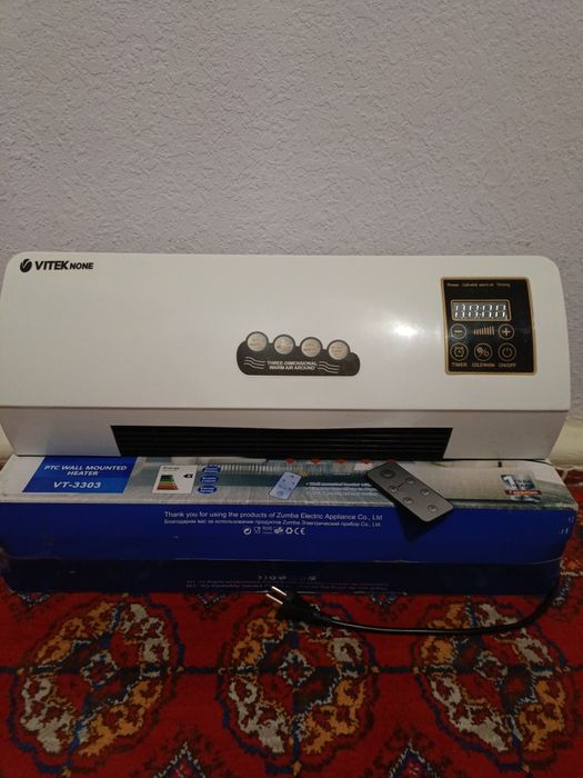 Mini konditsaner.Issiq va sovuq xavo chiqaradi.Pulti bor. Yangii