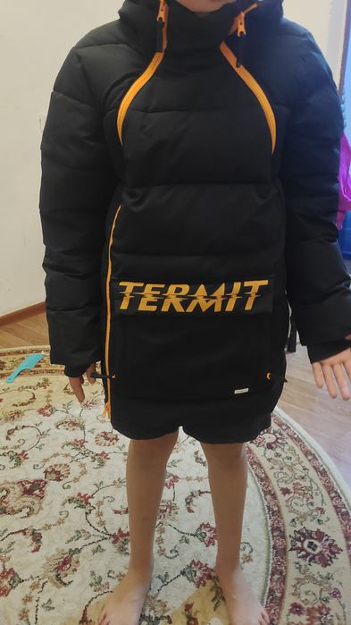 Куртка пуховик , на зиму подходит на лет 10..11.