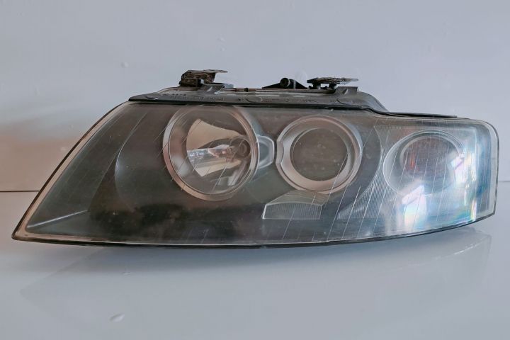 Far Xenon stanga  fara droser cu cleme reparata 6020111399 Audi A3 8P