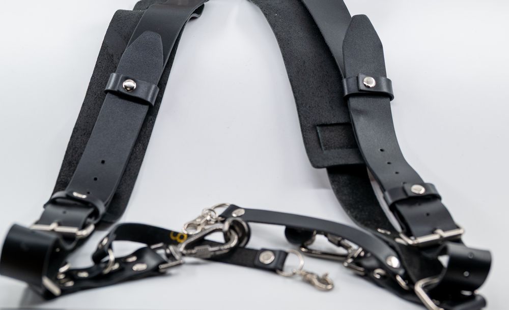 Кожен колан за два фотоапарата