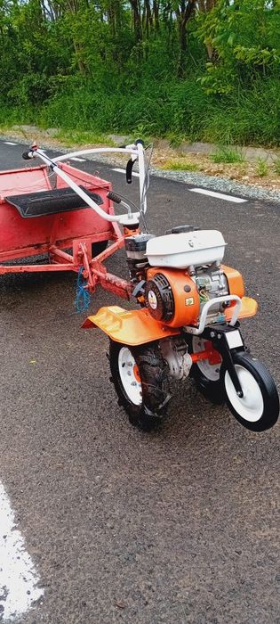 Motocultor cu remorcă și freză aproape nou