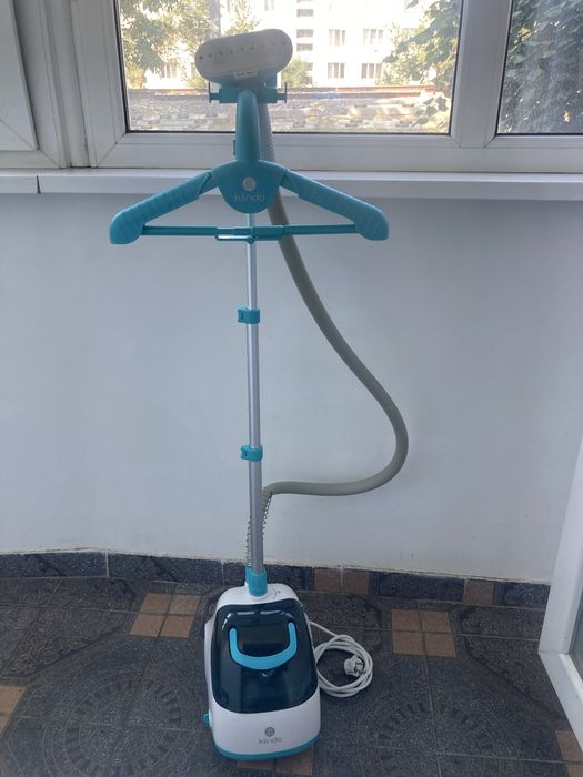 Aparat de calcat vertical cu abur