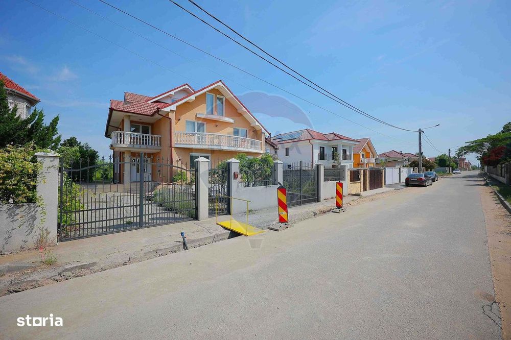 Casă cu 6 camere și 1000mp teren de vânzare în Sânmartin