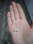 Lantisor argint pe fir transparent