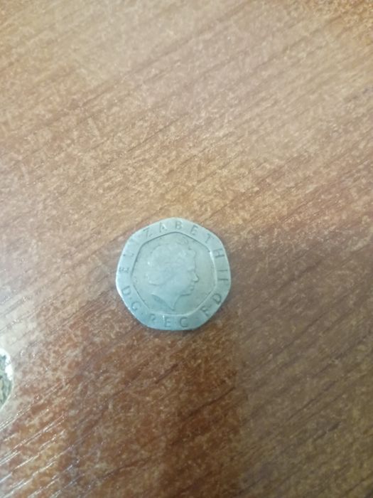 Продам монету британский