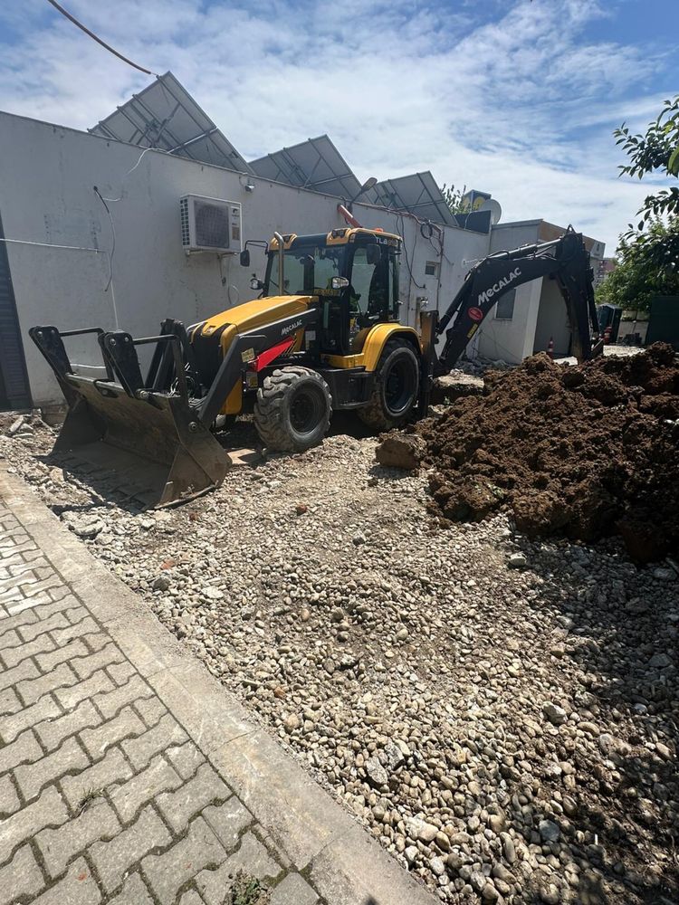 Inchiriez buldoexcavator cu picon