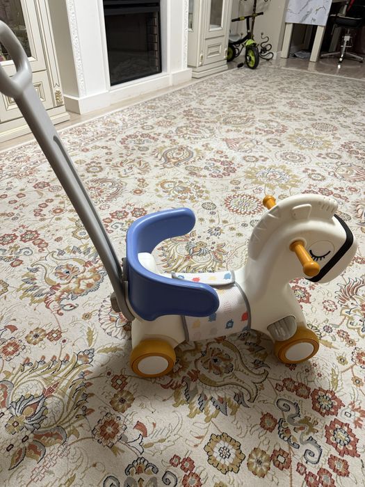 Игрушка лошадка как ведосипед