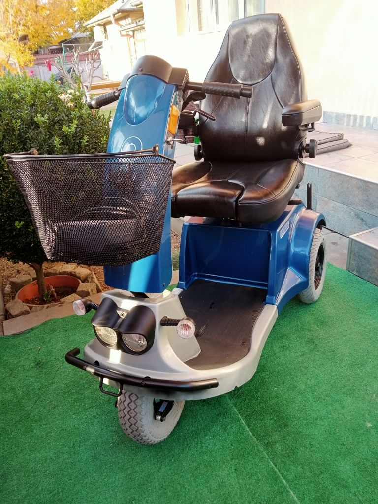 Căruț carucior scaun scuter dizabilități dezabilitati handicap electri