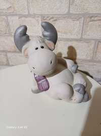Статуетка на крава