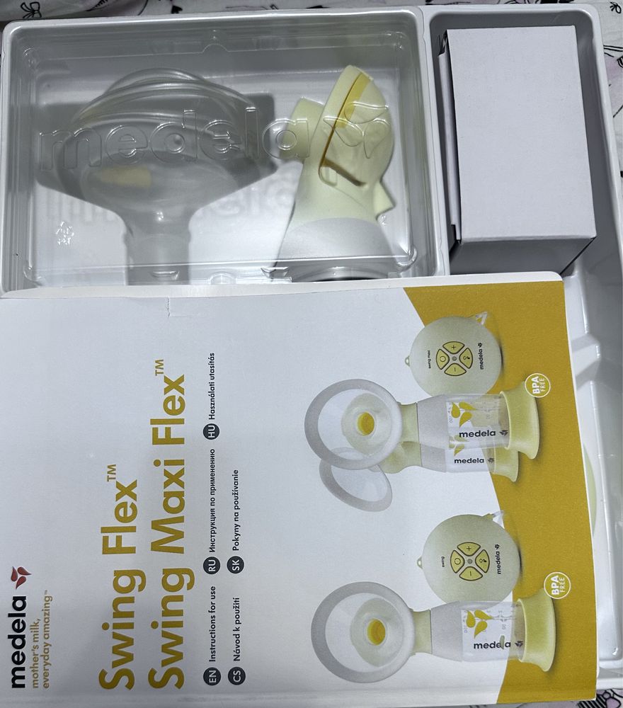 Молокоотсос Medela