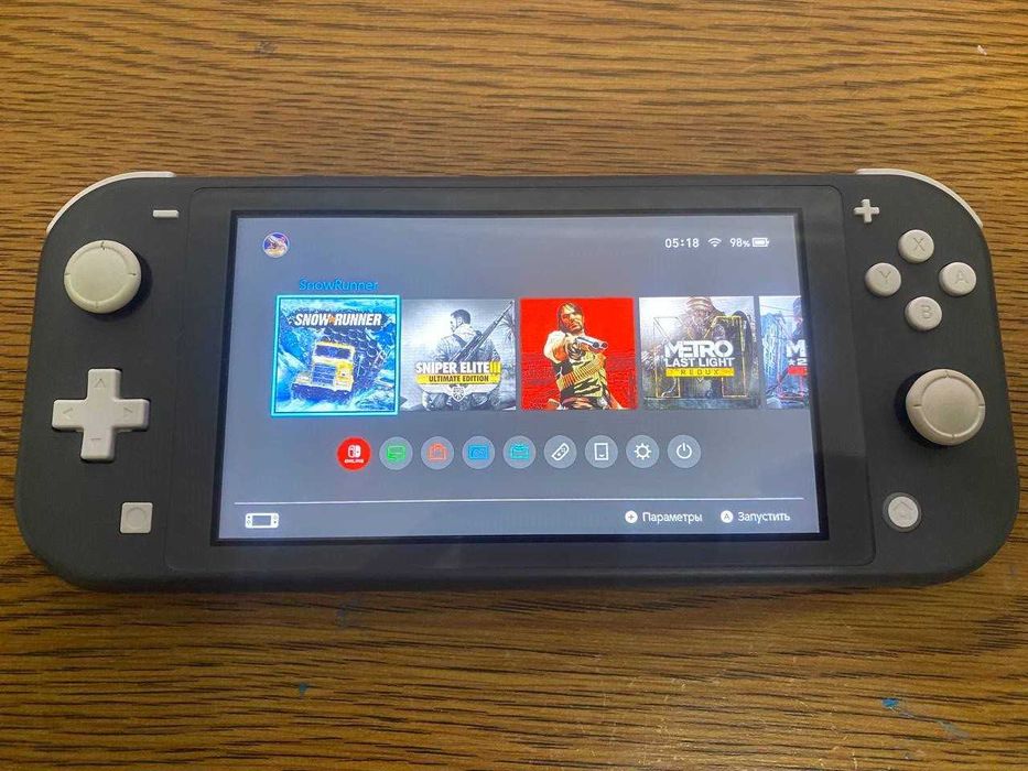 Nintendo switch lite чипованая с играми.