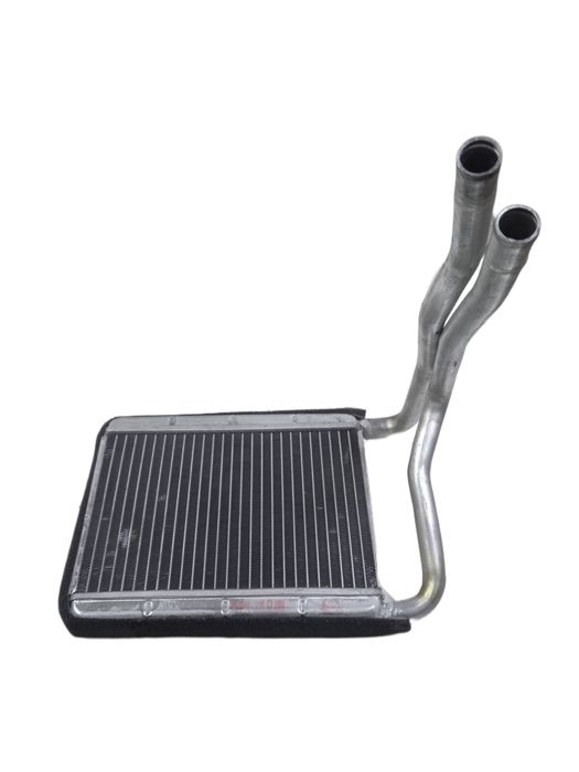 Радиатор печки Geely Sc7.