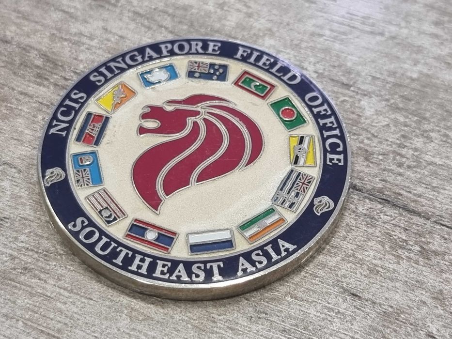 Монета NCIS Singapore