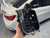 Consola BMW cu schimbator iDrive