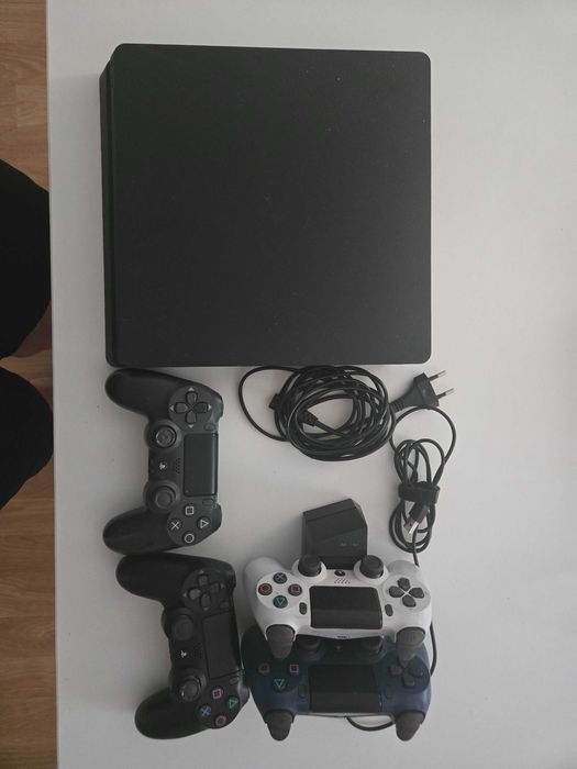 Sony Playstation 4. charge station and 4 gamepad and Need for Speed