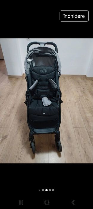 Cărucior gri aproape nou