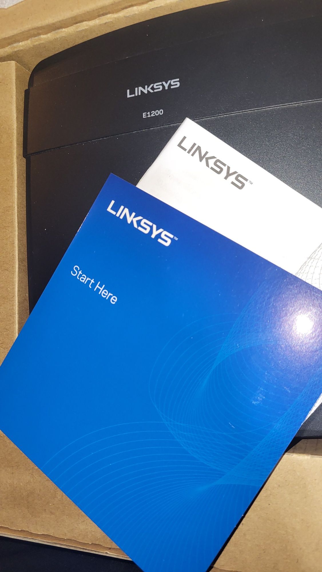 Linksys E1200- Рутер