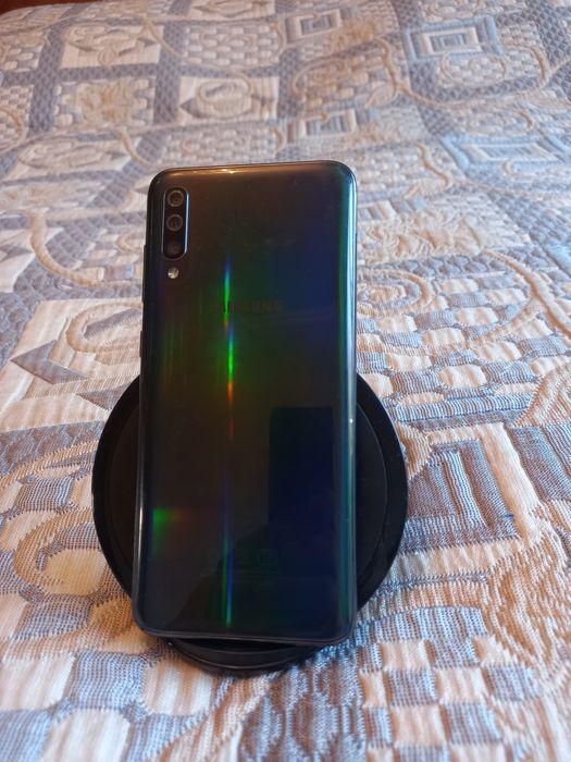 Самсунг а50 64гб