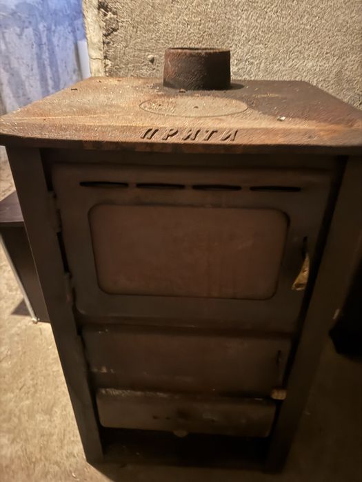 Камина с дърва чугунена