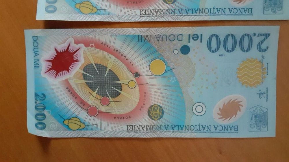 Vand bancnote de 2.000 lei cu eclipsa