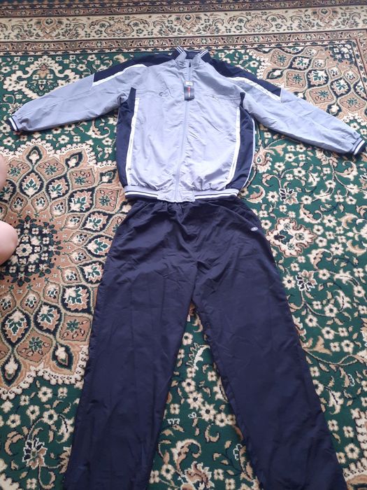 Новый  спортивный костюм 58-62размер