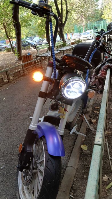 Scuter electric Dogebos