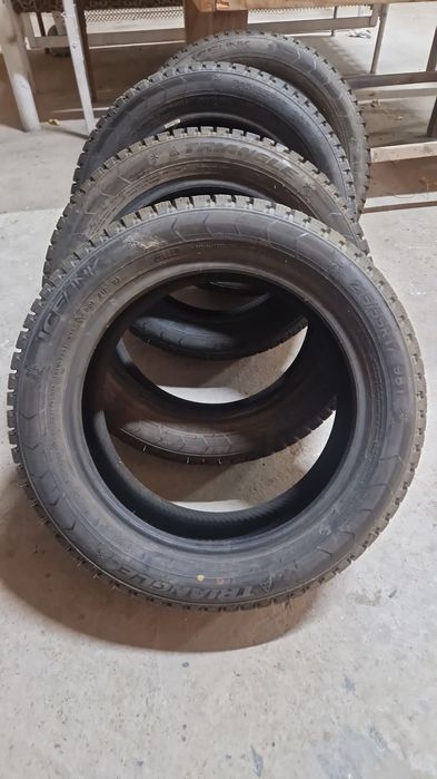 Зимний шиповка Триэнджл 215/55/17