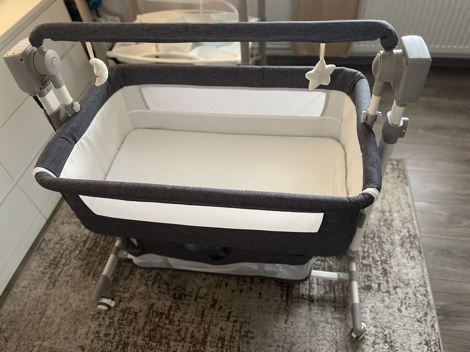 Patut pentru bebelusi cu functie de leganare si muzicala